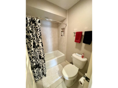 Welcome to 49 E Via Roma, a refined 2-bedroom, 3-bath townhome on Crestview Country Club in Kansas - for sale on GolfHomes.com, golf home, golf lot
