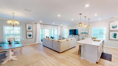 Experience coastal living at its finest with this on Lost Key Golf Club in Florida - for sale on GolfHomes.com, golf home, golf lot