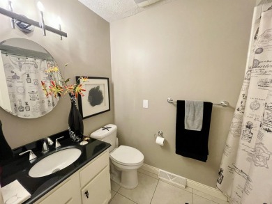 Welcome to 49 E Via Roma, a refined 2-bedroom, 3-bath townhome on Crestview Country Club in Kansas - for sale on GolfHomes.com, golf home, golf lot
