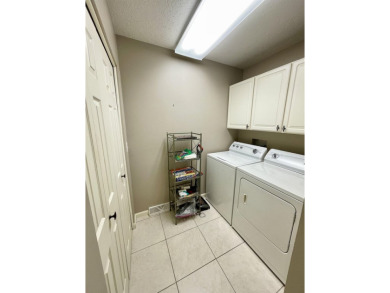 Welcome to 49 E Via Roma, a refined 2-bedroom, 3-bath townhome on Crestview Country Club in Kansas - for sale on GolfHomes.com, golf home, golf lot