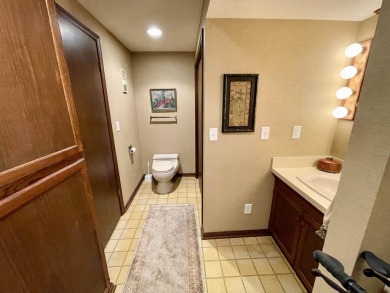 Welcome to 49 E Via Roma, a refined 2-bedroom, 3-bath townhome on Crestview Country Club in Kansas - for sale on GolfHomes.com, golf home, golf lot