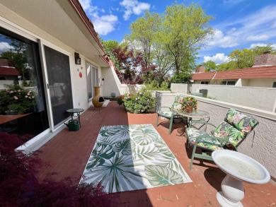 Welcome to 49 E Via Roma, a refined 2-bedroom, 3-bath townhome on Crestview Country Club in Kansas - for sale on GolfHomes.com, golf home, golf lot