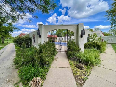 Welcome to 49 E Via Roma, a refined 2-bedroom, 3-bath townhome on Crestview Country Club in Kansas - for sale on GolfHomes.com, golf home, golf lot