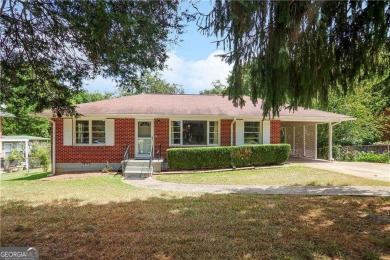 Beautifully renovated 4-bedroom, 2-bathroom home with on Browns Mill Golf Course in Georgia - for sale on GolfHomes.com, golf home, golf lot