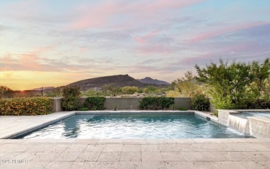As you enter, you're greeted by soaring ceilings and walls of on Desert Mountain Golf Club - Renegade Course in Arizona - for sale on GolfHomes.com, golf home, golf lot