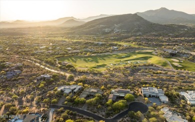 As you enter, you're greeted by soaring ceilings and walls of on Desert Mountain Golf Club - Renegade Course in Arizona - for sale on GolfHomes.com, golf home, golf lot