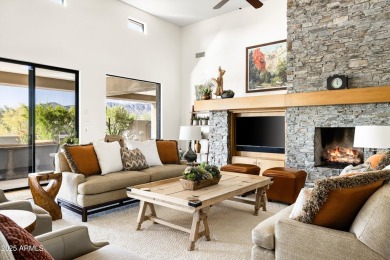 As you enter, you're greeted by soaring ceilings and walls of on Desert Mountain Golf Club - Renegade Course in Arizona - for sale on GolfHomes.com, golf home, golf lot