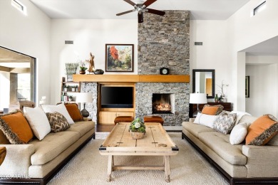 As you enter, you're greeted by soaring ceilings and walls of on Desert Mountain Golf Club - Renegade Course in Arizona - for sale on GolfHomes.com, golf home, golf lot
