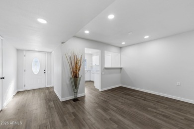 Ideally situated on a corner lot, this stunning home has on Leisure World Country Club in Arizona - for sale on GolfHomes.com, golf home, golf lot