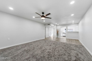 Ideally situated on a corner lot, this stunning home has on Leisure World Country Club in Arizona - for sale on GolfHomes.com, golf home, golf lot