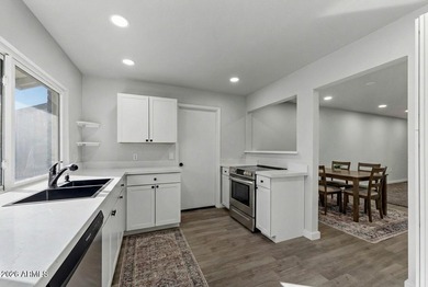 Ideally situated on a corner lot, this stunning home has on Leisure World Country Club in Arizona - for sale on GolfHomes.com, golf home, golf lot