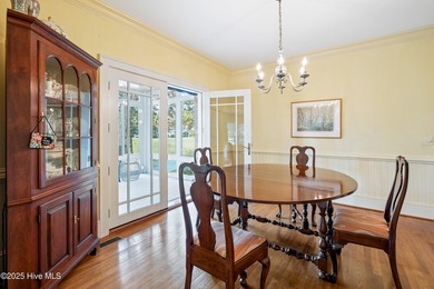 Privately nestled among mature trees with serene pond views and on Porters Neck Country Club in North Carolina - for sale on GolfHomes.com, golf home, golf lot