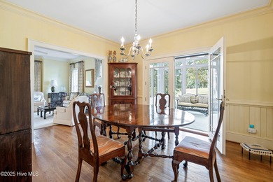 Privately nestled among mature trees with serene pond views and on Porters Neck Country Club in North Carolina - for sale on GolfHomes.com, golf home, golf lot