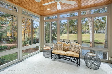 Privately nestled among mature trees with serene pond views and on Porters Neck Country Club in North Carolina - for sale on GolfHomes.com, golf home, golf lot