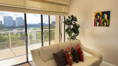 Experience luxury living in this stunning 2-bedroom, 2-bath on Turnberry Isle Resort and Club in Florida - for sale on GolfHomes.com, golf home, golf lot