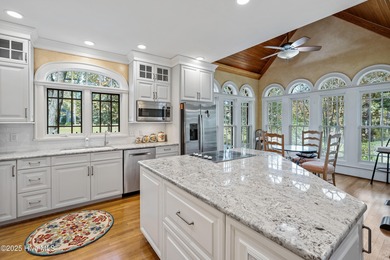 Privately nestled among mature trees with serene pond views and on Porters Neck Country Club in North Carolina - for sale on GolfHomes.com, golf home, golf lot