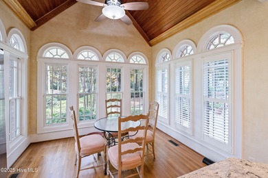 Privately nestled among mature trees with serene pond views and on Porters Neck Country Club in North Carolina - for sale on GolfHomes.com, golf home, golf lot