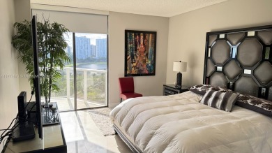 Experience luxury living in this stunning 2-bedroom, 2-bath on Turnberry Isle Resort and Club in Florida - for sale on GolfHomes.com, golf home, golf lot