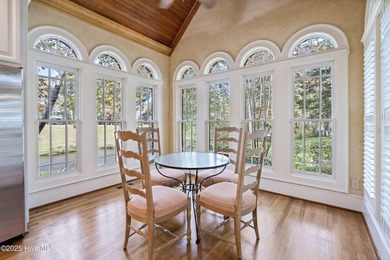 Privately nestled among mature trees with serene pond views and on Porters Neck Country Club in North Carolina - for sale on GolfHomes.com, golf home, golf lot