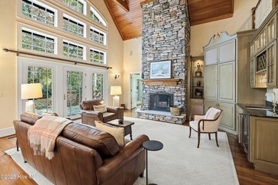 Privately nestled among mature trees with serene pond views and on Porters Neck Country Club in North Carolina - for sale on GolfHomes.com, golf home, golf lot