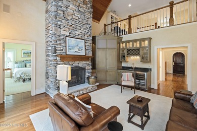 Privately nestled among mature trees with serene pond views and on Porters Neck Country Club in North Carolina - for sale on GolfHomes.com, golf home, golf lot