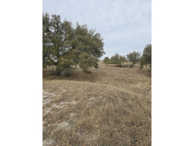 Stunning Hill Country views await from this spacious corner lot on Ram Rock Golf Course in Texas - for sale on GolfHomes.com, golf home, golf lot