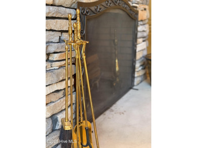 Privately nestled among mature trees with serene pond views and on Porters Neck Country Club in North Carolina - for sale on GolfHomes.com, golf home, golf lot