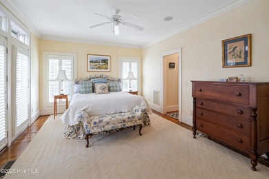 Privately nestled among mature trees with serene pond views and on Porters Neck Country Club in North Carolina - for sale on GolfHomes.com, golf home, golf lot