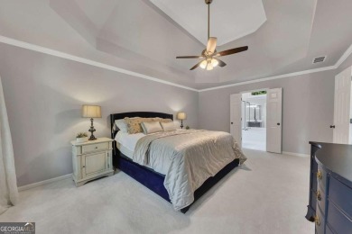 Welcome to this stunning home located in the highly desirable on Towne Lake Hills Golf Club in Georgia - for sale on GolfHomes.com, golf home, golf lot