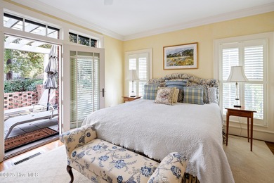 Privately nestled among mature trees with serene pond views and on Porters Neck Country Club in North Carolina - for sale on GolfHomes.com, golf home, golf lot