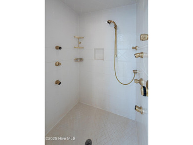 Privately nestled among mature trees with serene pond views and on Porters Neck Country Club in North Carolina - for sale on GolfHomes.com, golf home, golf lot