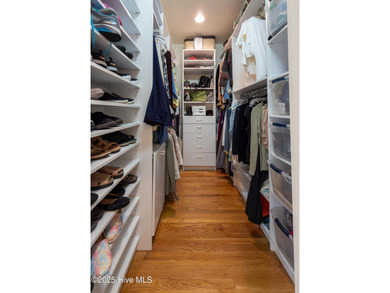 Privately nestled among mature trees with serene pond views and on Porters Neck Country Club in North Carolina - for sale on GolfHomes.com, golf home, golf lot