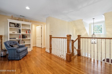 Privately nestled among mature trees with serene pond views and on Porters Neck Country Club in North Carolina - for sale on GolfHomes.com, golf home, golf lot