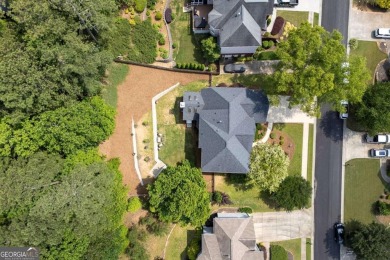 Welcome to this stunning home located in the highly desirable on Towne Lake Hills Golf Club in Georgia - for sale on GolfHomes.com, golf home, golf lot