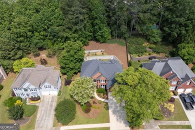 Welcome to this stunning home located in the highly desirable on Towne Lake Hills Golf Club in Georgia - for sale on GolfHomes.com, golf home, golf lot