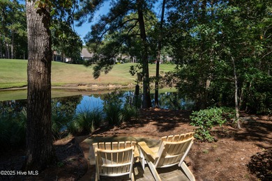 Privately nestled among mature trees with serene pond views and on Porters Neck Country Club in North Carolina - for sale on GolfHomes.com, golf home, golf lot