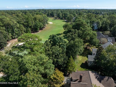 Privately nestled among mature trees with serene pond views and on Porters Neck Country Club in North Carolina - for sale on GolfHomes.com, golf home, golf lot