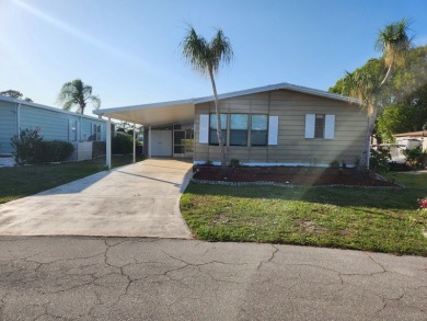 Spacious two-bedroom, two-bath home located in the gated golf on Lake Fairways Country Club in Florida - for sale on GolfHomes.com, golf home, golf lot