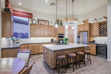 Enjoy an active lifestyle in the gated enclave of Legend Trail on Legend Trail Golf Club in Arizona - for sale on GolfHomes.com, golf home, golf lot