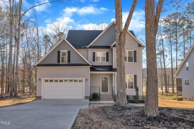 Enjoy this beautiful custom built MOVE-IN READY home perfectly on River Golf and County Club at Lake Royale in North Carolina - for sale on GolfHomes.com, golf home, golf lot