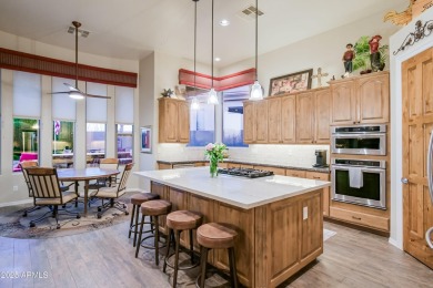 Enjoy an active lifestyle in the gated enclave of Legend Trail on Legend Trail Golf Club in Arizona - for sale on GolfHomes.com, golf home, golf lot