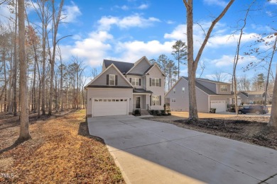 Enjoy this beautiful custom built MOVE-IN READY home perfectly on River Golf and County Club at Lake Royale in North Carolina - for sale on GolfHomes.com, golf home, golf lot