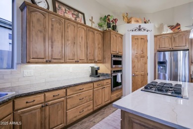 Enjoy an active lifestyle in the gated enclave of Legend Trail on Legend Trail Golf Club in Arizona - for sale on GolfHomes.com, golf home, golf lot