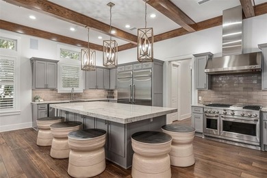 Set on the water in one of Texas's most coveted lake communities on Long Cove Golf Course in Texas - for sale on GolfHomes.com, golf home, golf lot