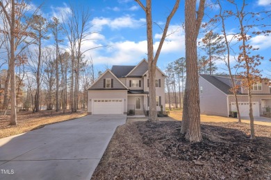 Enjoy this beautiful custom built MOVE-IN READY home perfectly on River Golf and County Club at Lake Royale in North Carolina - for sale on GolfHomes.com, golf home, golf lot