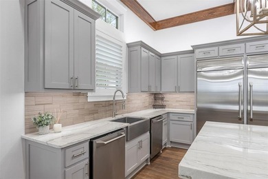 Set on the water in one of Texas's most coveted lake communities on Long Cove Golf Course in Texas - for sale on GolfHomes.com, golf home, golf lot