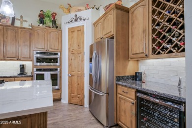 Enjoy an active lifestyle in the gated enclave of Legend Trail on Legend Trail Golf Club in Arizona - for sale on GolfHomes.com, golf home, golf lot