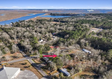 Great investment opportunity with mixed zoning C-2 and R-1 right on Mississippi National Golf Course in Mississippi - for sale on GolfHomes.com, golf home, golf lot