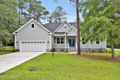 Welcome to your coastal haven, nestled among ancient oaks along on Lockwood Folly Country Club in North Carolina - for sale on GolfHomes.com, golf home, golf lot