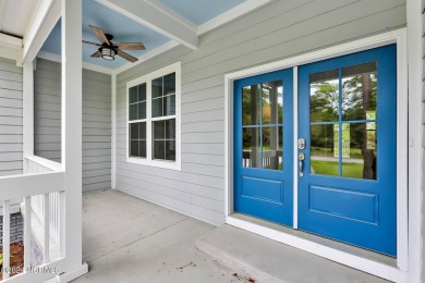 Welcome to your coastal haven, nestled among ancient oaks along on Lockwood Folly Country Club in North Carolina - for sale on GolfHomes.com, golf home, golf lot